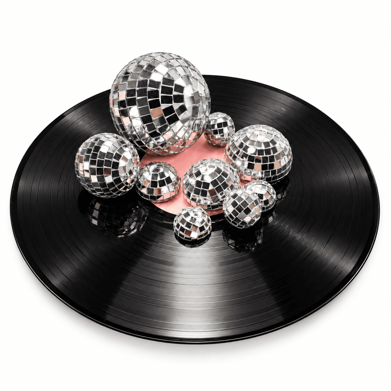 Speilkuler plassert på vinylplate som borddekor